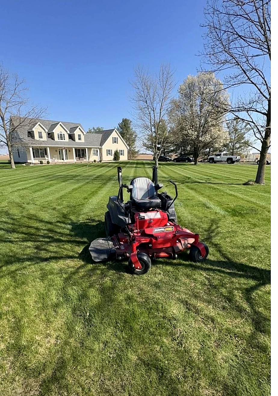 Ranch home with fresh mulched front beds